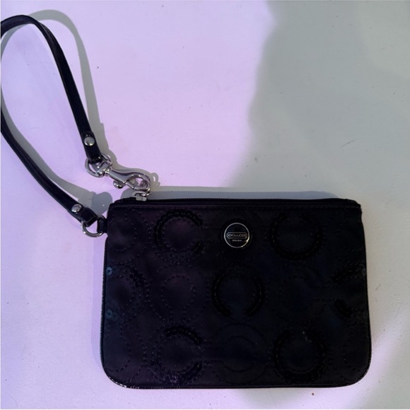 Coach Handbags - Coach EUC Black Wristlet with Embossed Logo